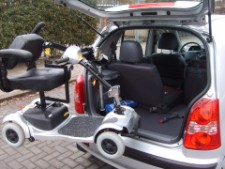 Scootmobiel met stoel meenemen